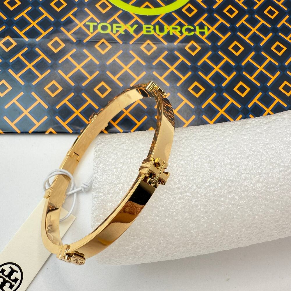 Tory Burch Classic Logo Hinge Bangle 168864 IN TORY GOLD $170